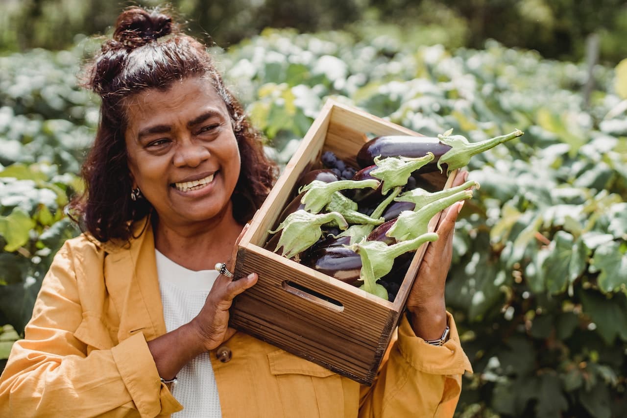 woman carrying fresh produce